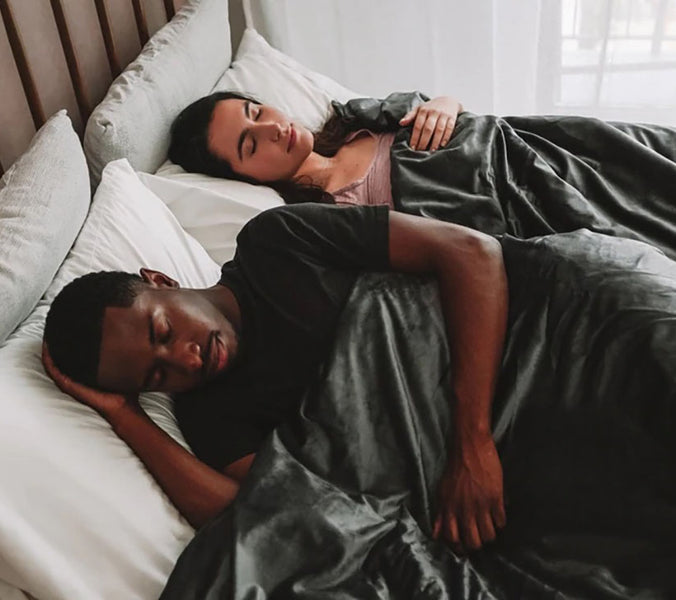 couple sleep in bed