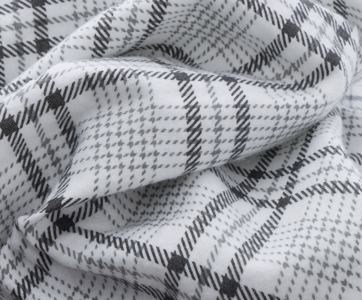 A close-up of 100% cotton wrinkle resistant gravity flannel sheets