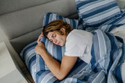 men sleeping on gravity blue flannel sheet