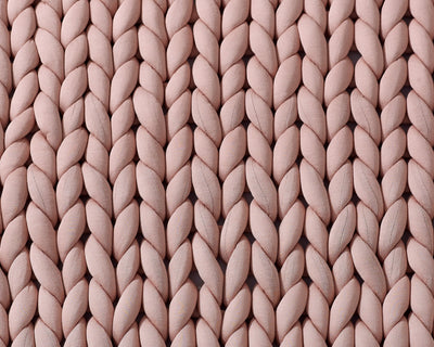 Closeup on the texture of the Clay Gravity Weighted Chunky Knit Blanket - #color_clay