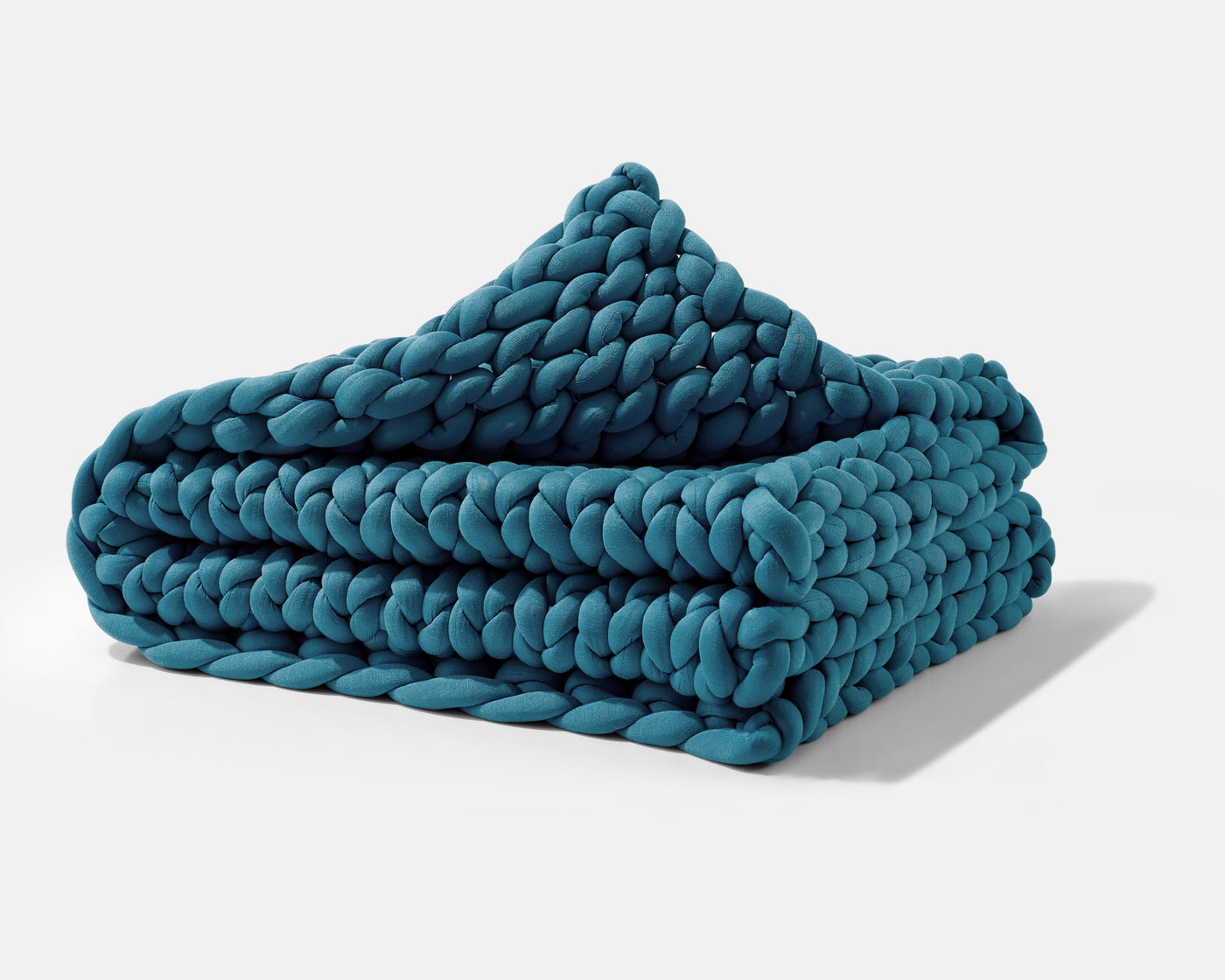 A folded Sapphire Blue Gravity Weighted Chunky Knit Blanket - #color_sapphire-blue