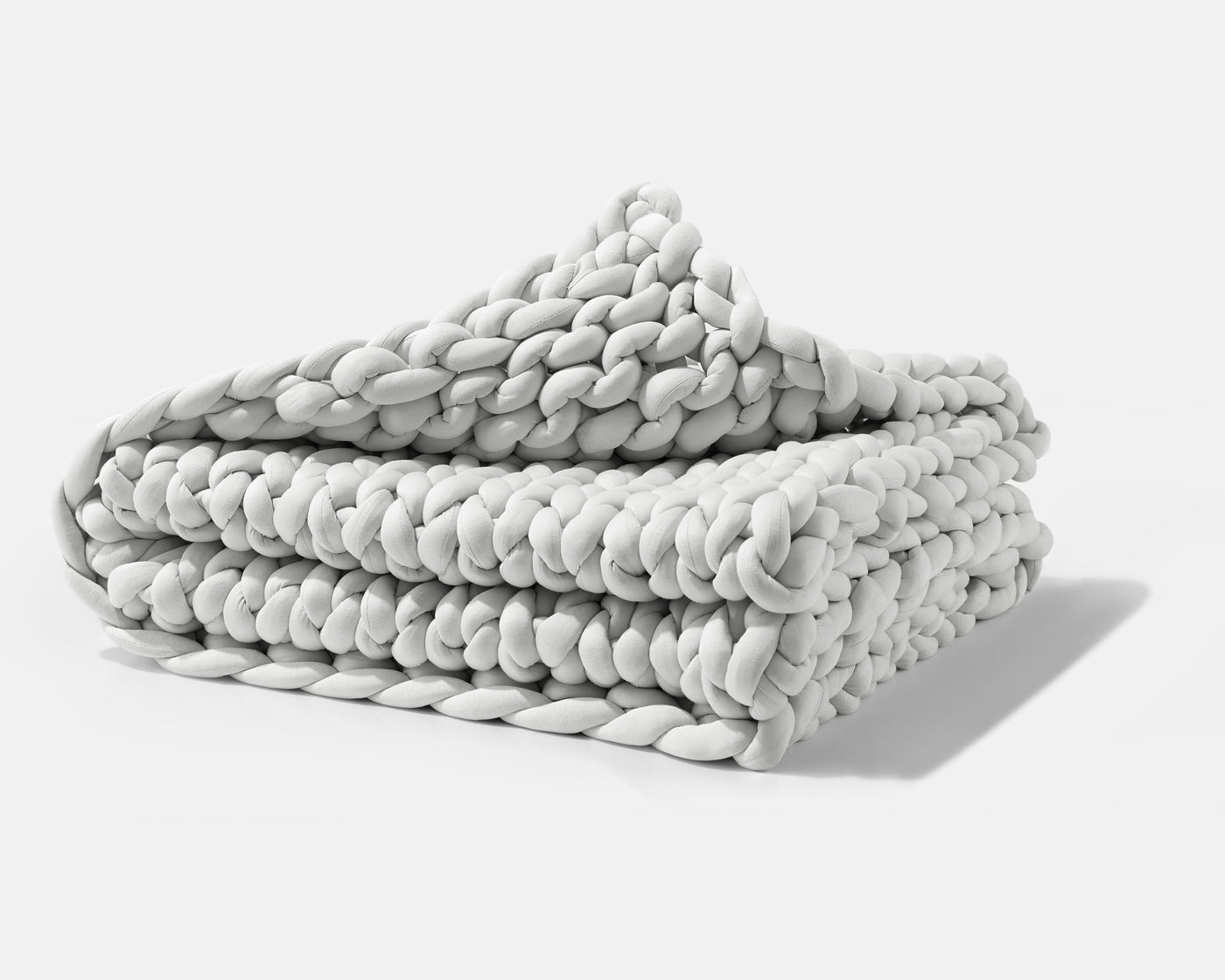 A folded Soft Grey Gravity Weighted Chunky Knit Blanket - #color_soft-grey