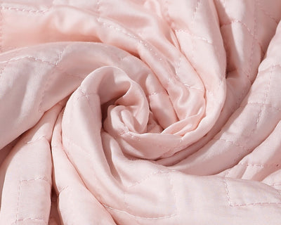 A twisted Dusty Pink Gravity Weighted Cooling Blanket - #color_dusty-pink