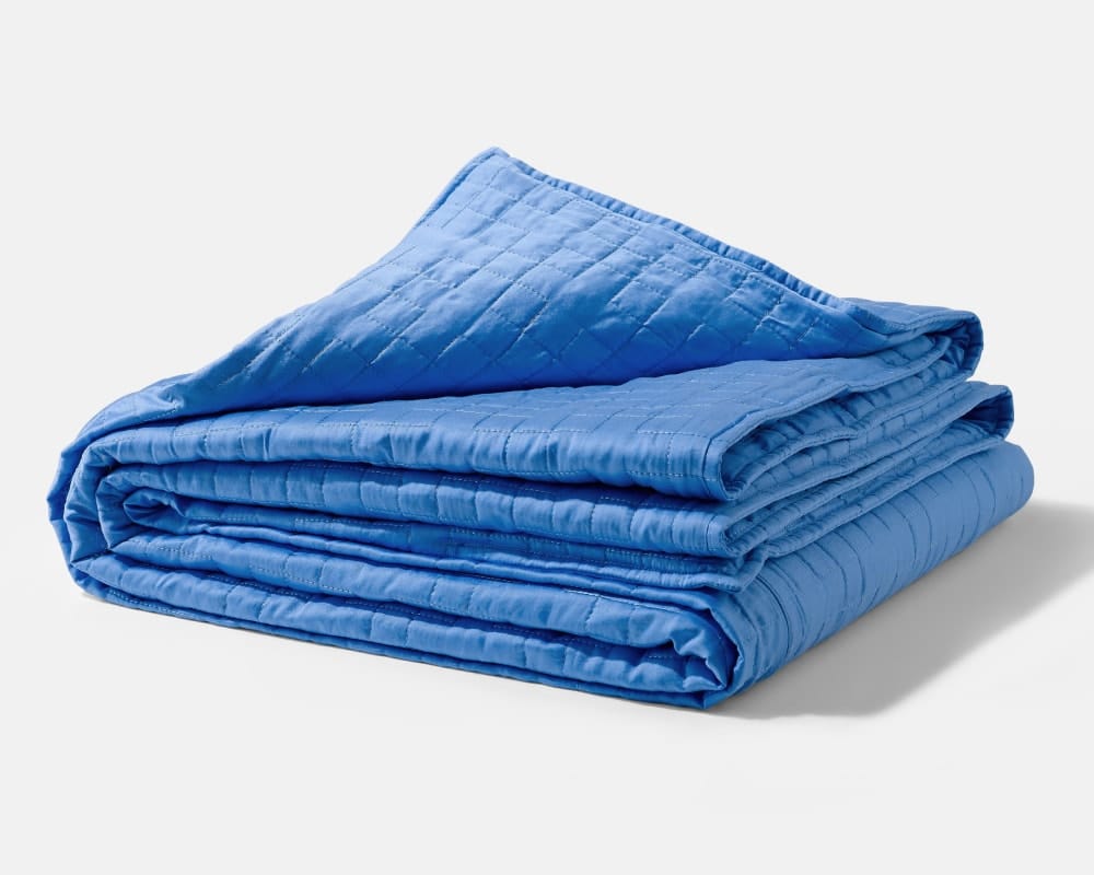 Folded Periwinkle Gravity Weighted Cooling Blanket - #color_cerulean-blue