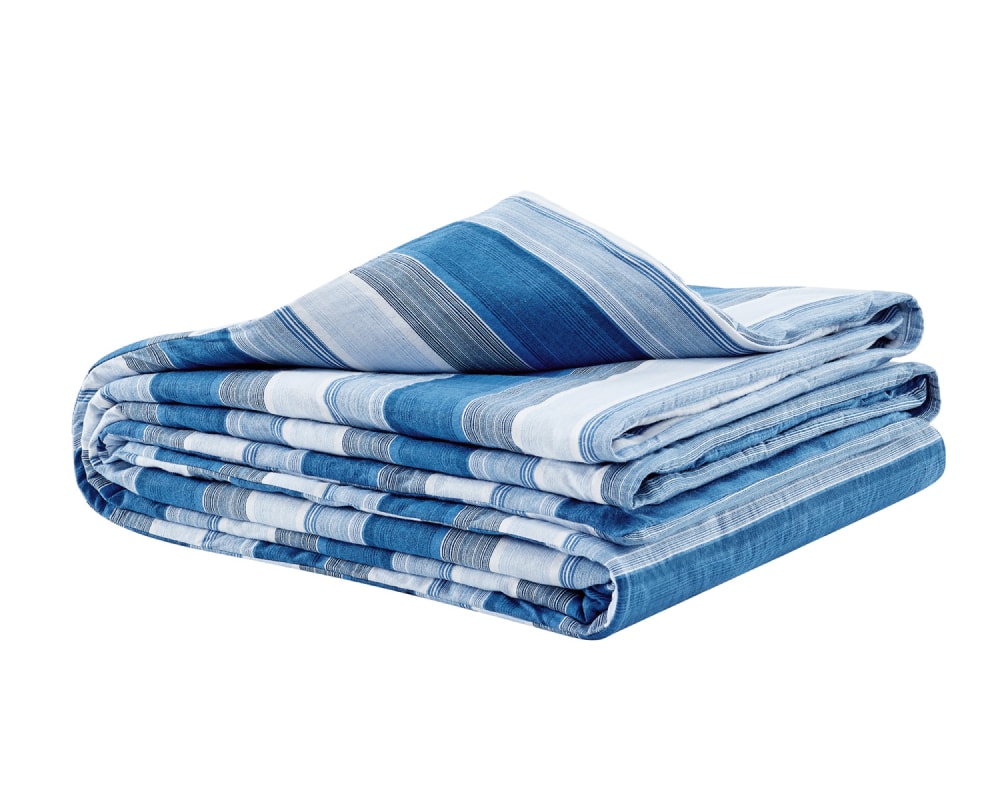 Blue striped flannel blanket folded against a white backdrop #color_blue-stripe