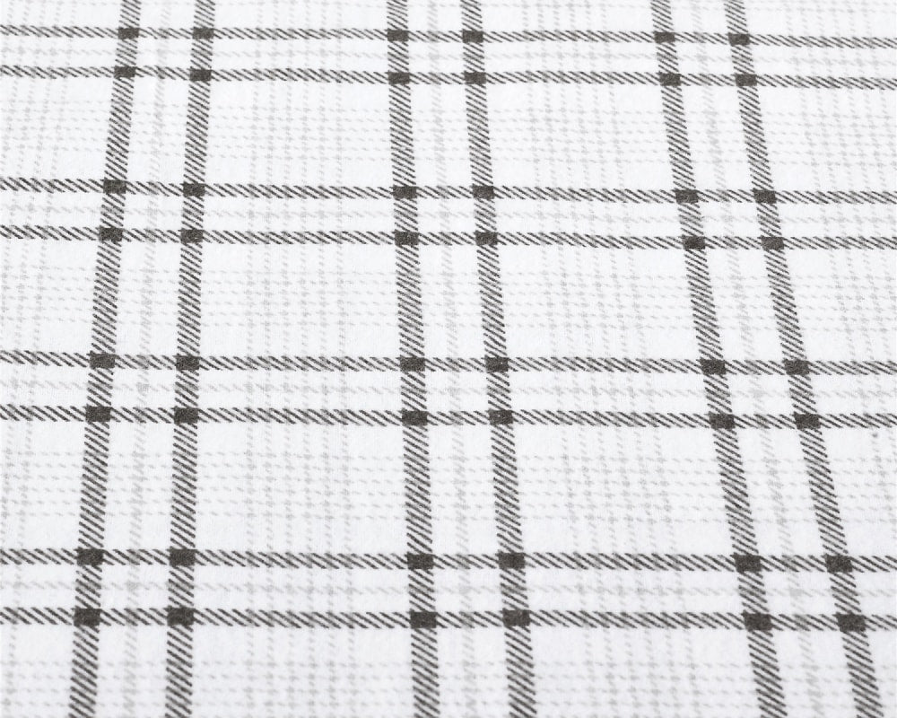 Closeup of grey flannel fabric #color_grey-plaid
