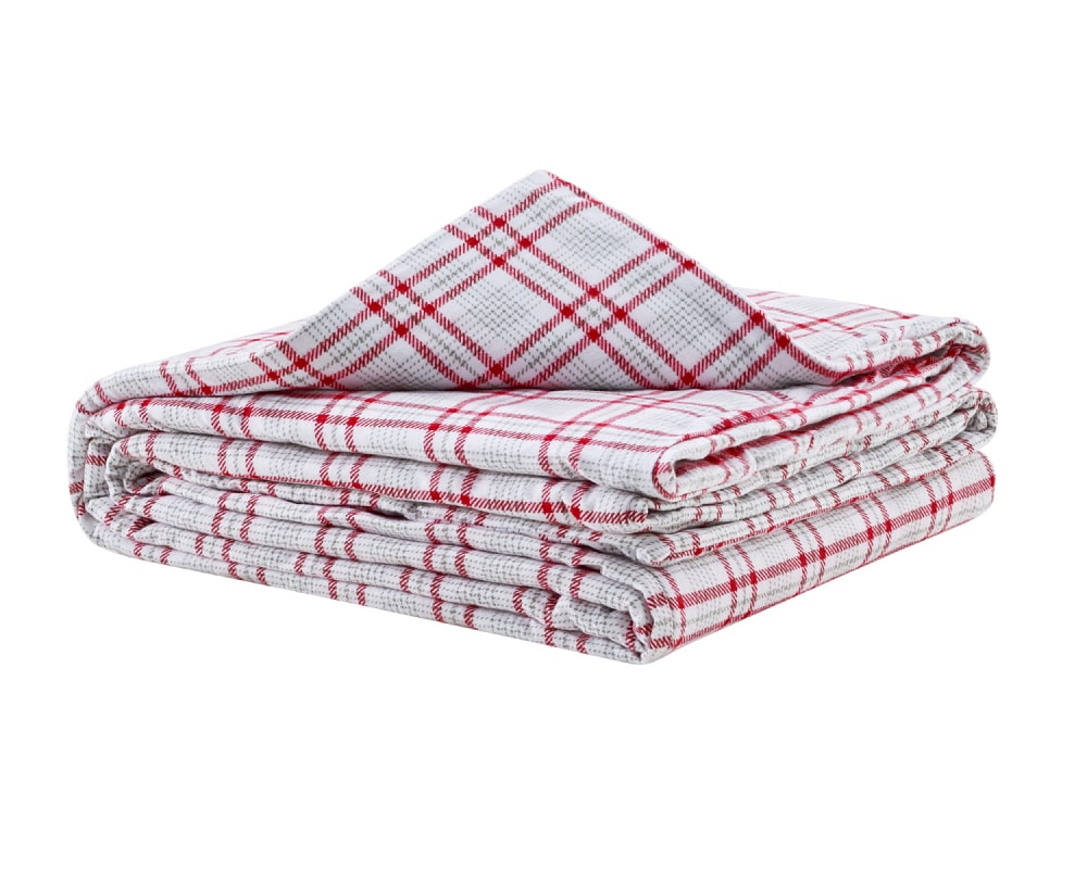 Red flannel blanket folded against a white backdrop #color_red-plaid