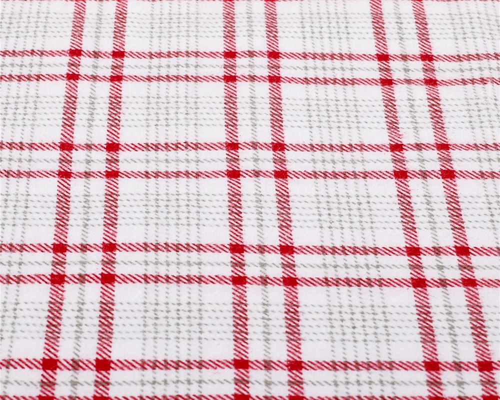Closeup of red plaid fabric #color_red-plaid