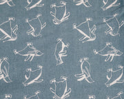 Closeup of gravity flannel sheets with a penguin pattern