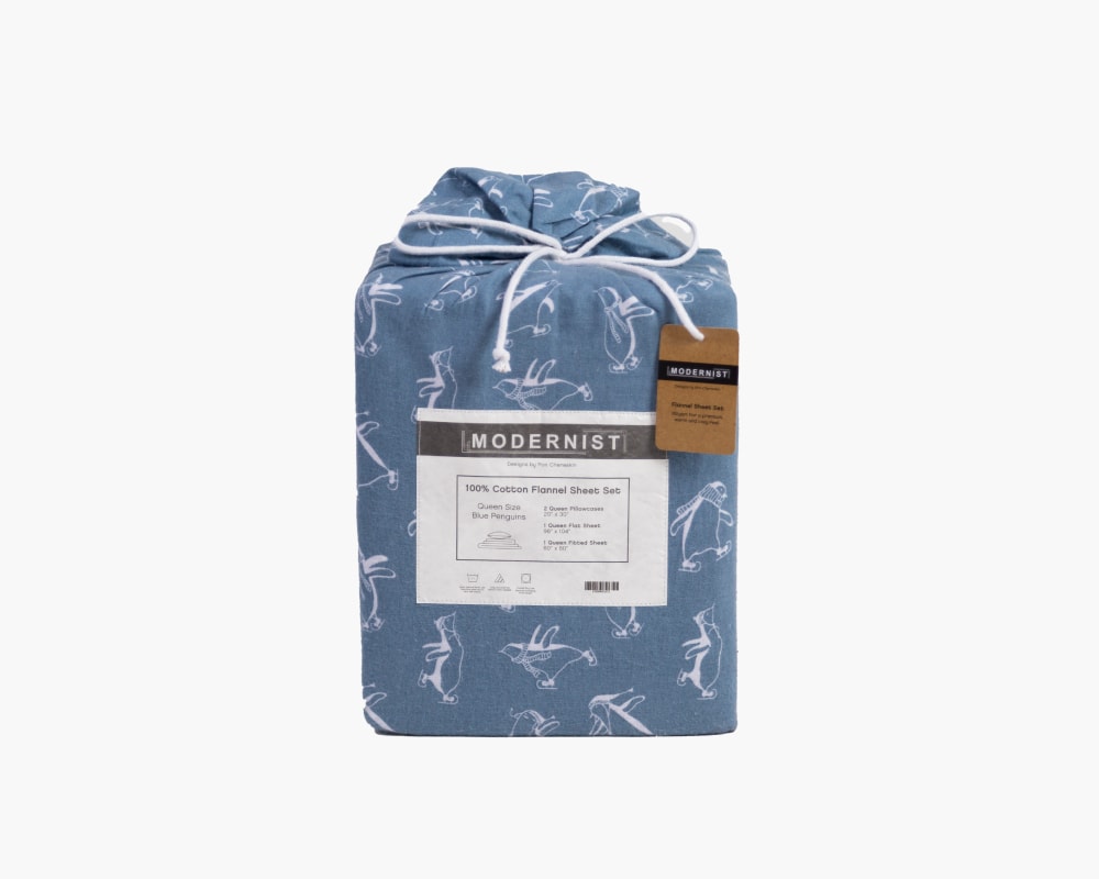 Packaging for 100% cotton sheet set with a penguin pattern #color_penguins
