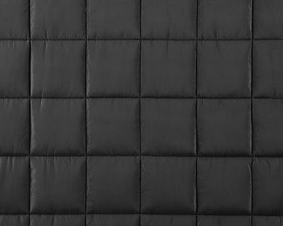 Closeup of black moisture-wicking fabric #color_black