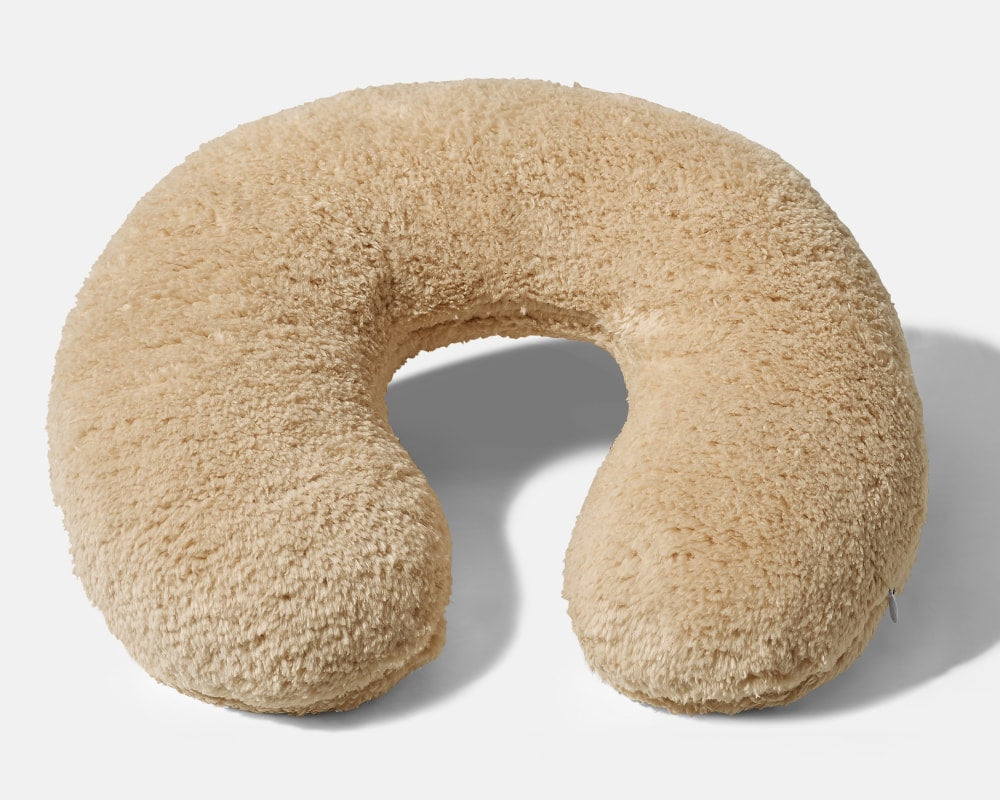 Tan Gravity Weighted Neck Pillow on a white background - #color_tan