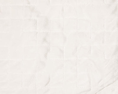 Closeup of stitching on plush white fabric - #color_white