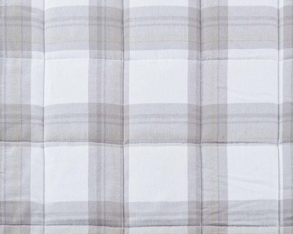 Closeup of light grey flannel fabric #color_light-grey-plaid